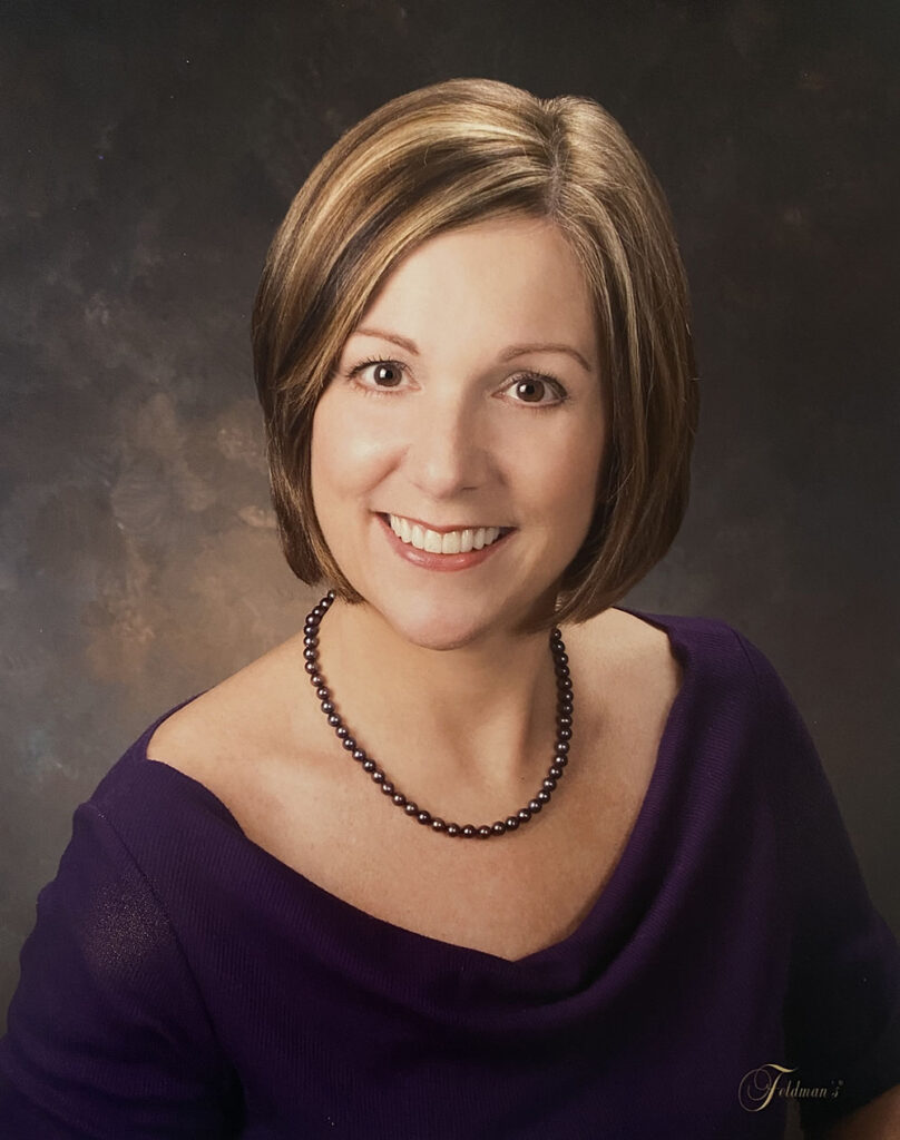 Anita, smiling