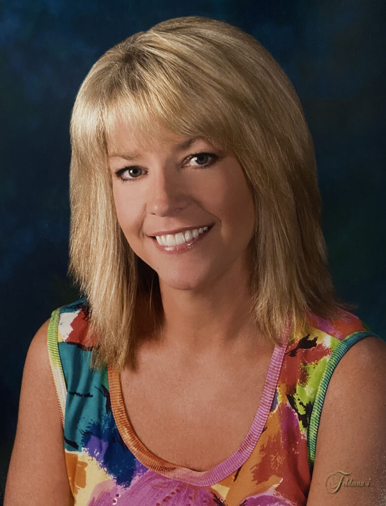 Debbie, smiling