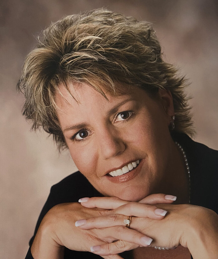 Julie, smiling